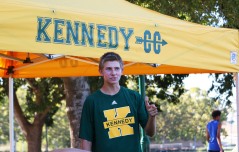 Luke Adel (Junior) posing in front of the Kennedy Cross Country tent. Photo by Alex Ng
