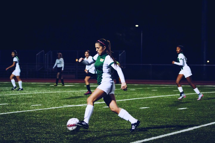 Jennifer Munoz takes the ball and rushes the opponent's goal (photo by Keegan Morris)